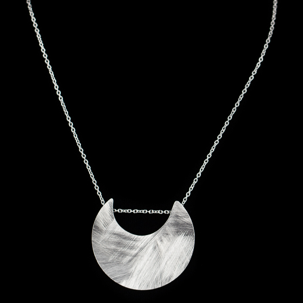 Silver crescent pendant with necklace