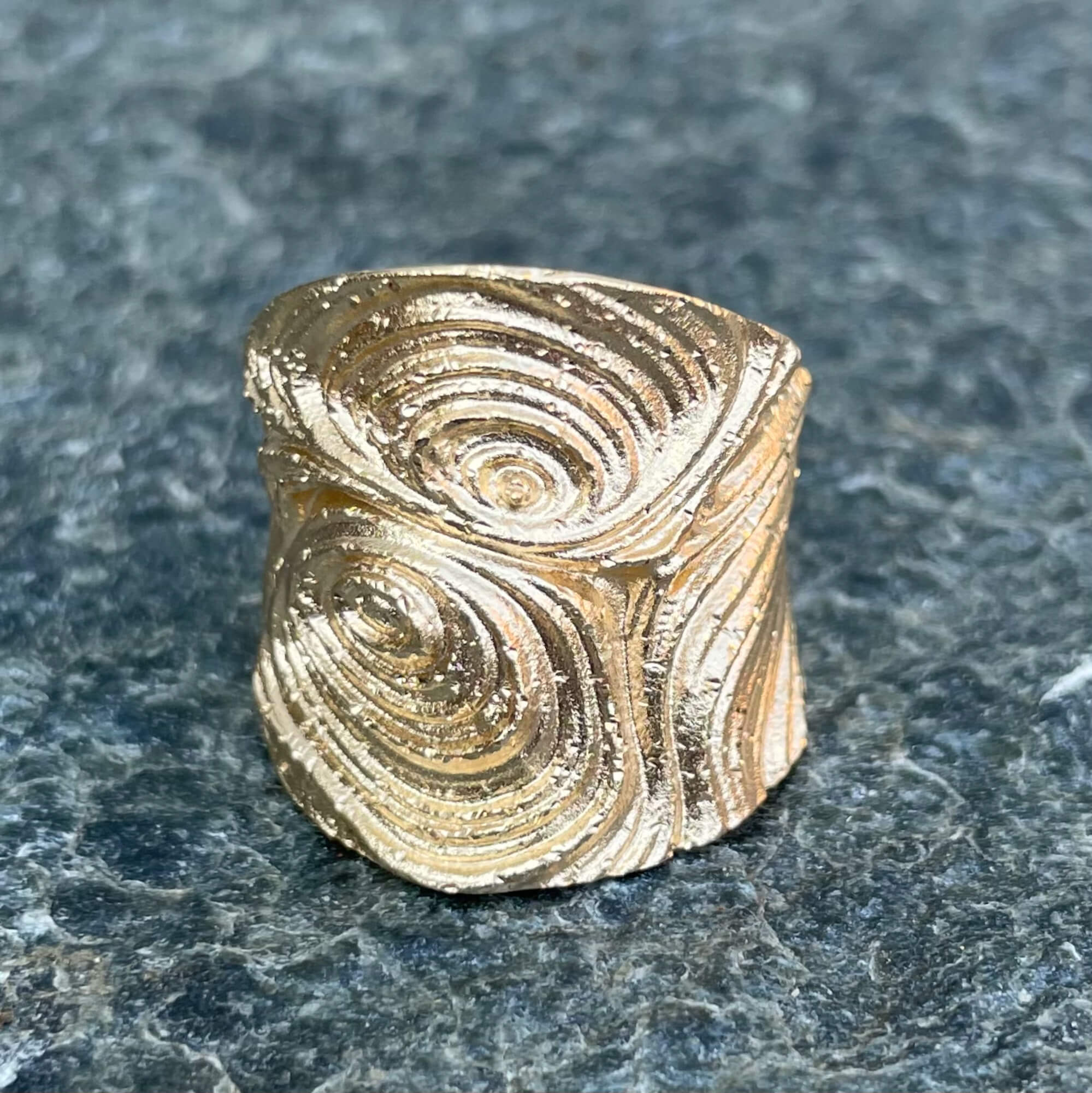 Created ring made of gold-plated silver