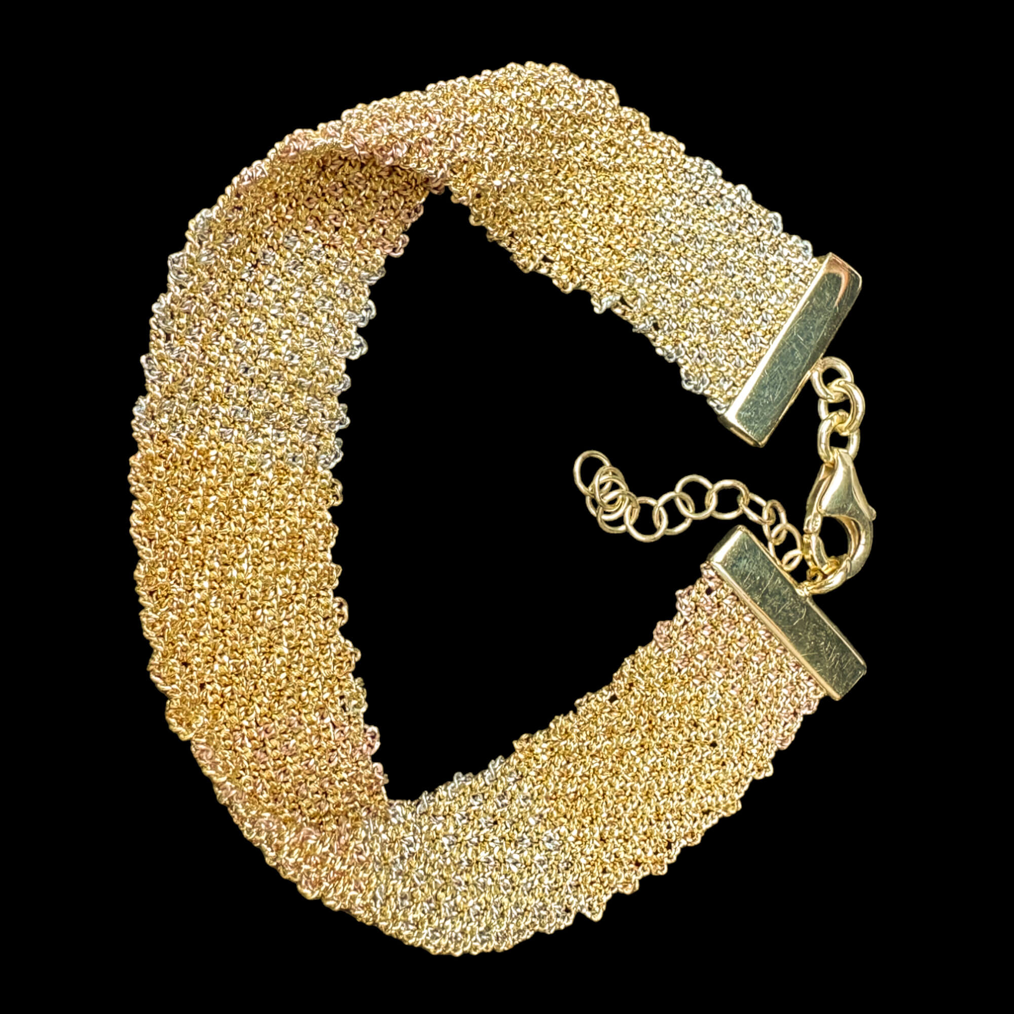 Three-colored gold-plated bracelet of interwoven chains