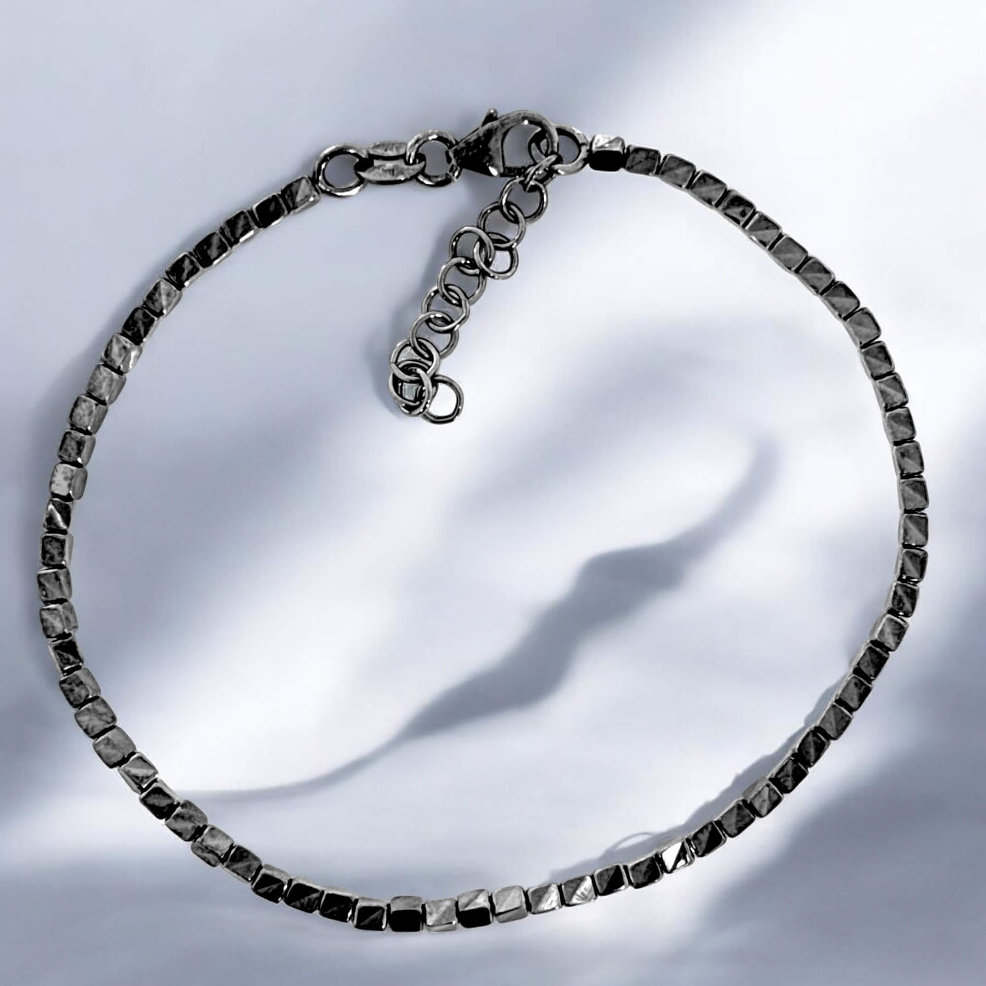 Refined block bracelet made of hematite