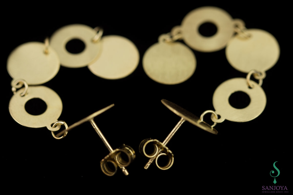 Matt gilt and long earrings with circles
