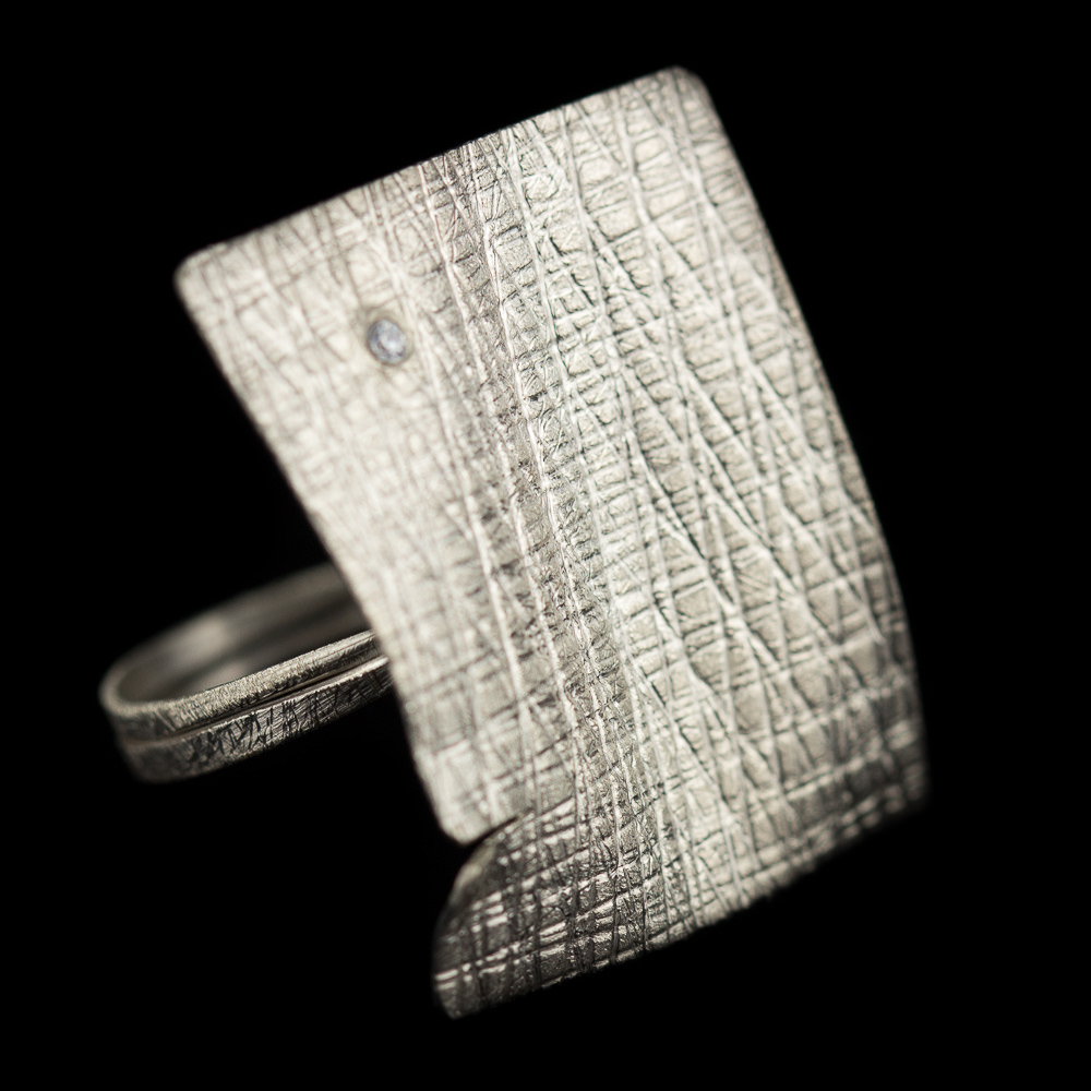 Silver rectangular ring with zirconia