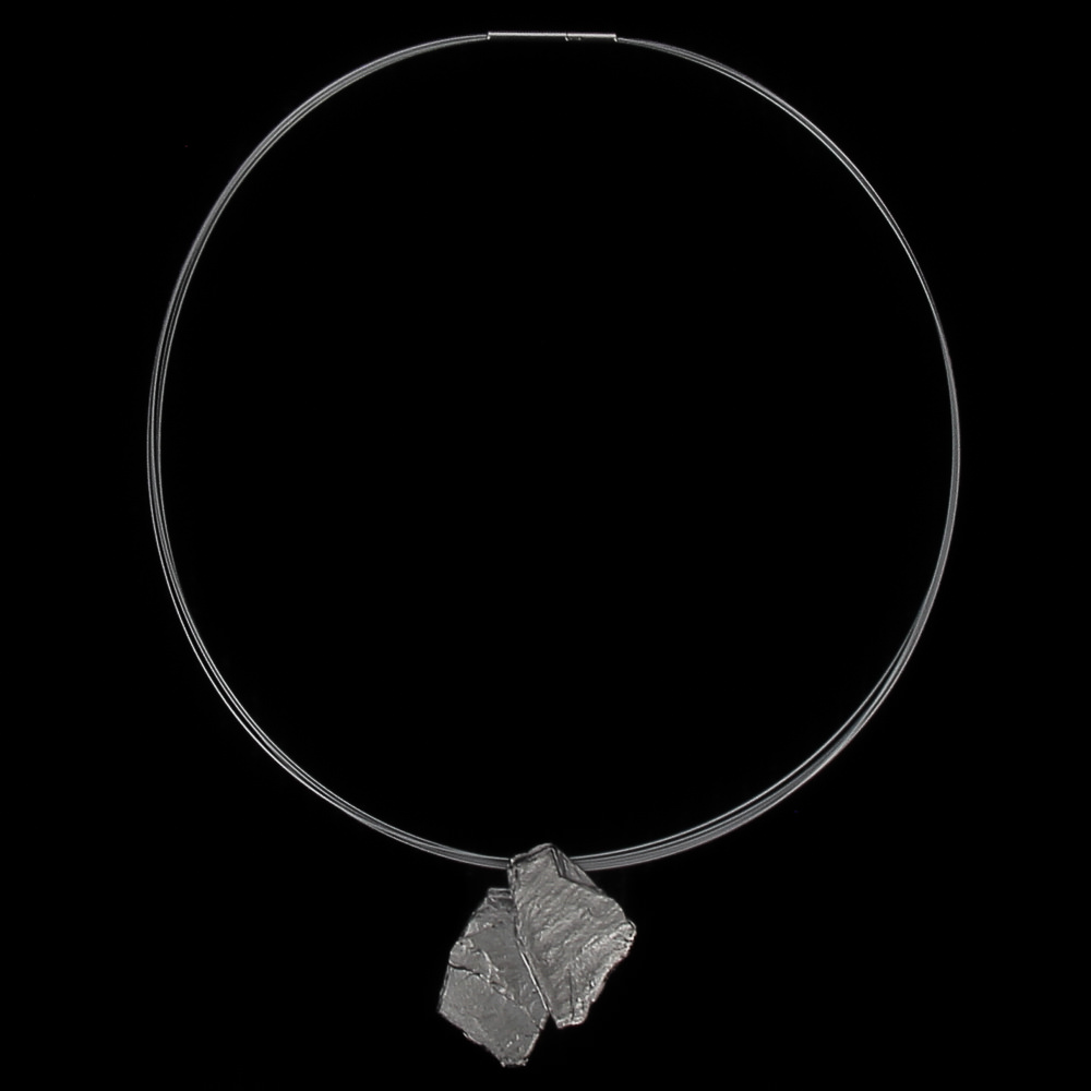 Stone-shaped pendant of dark silver 'chain'