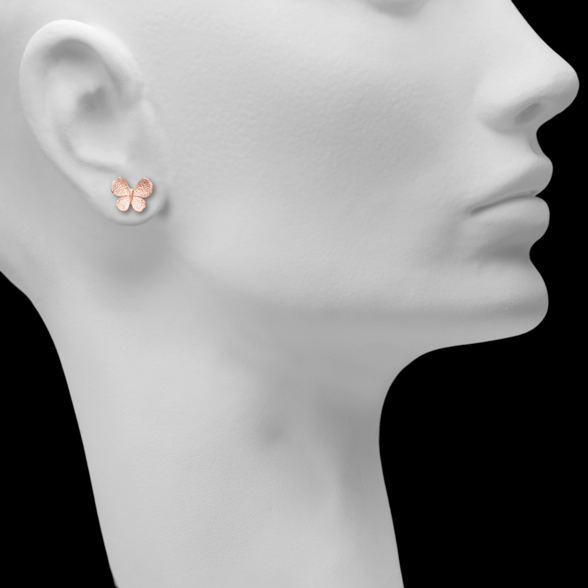 Mini vlinder oorbellen in rosé