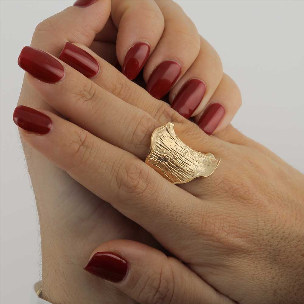 Gold plated ring, wide and diamond-coated