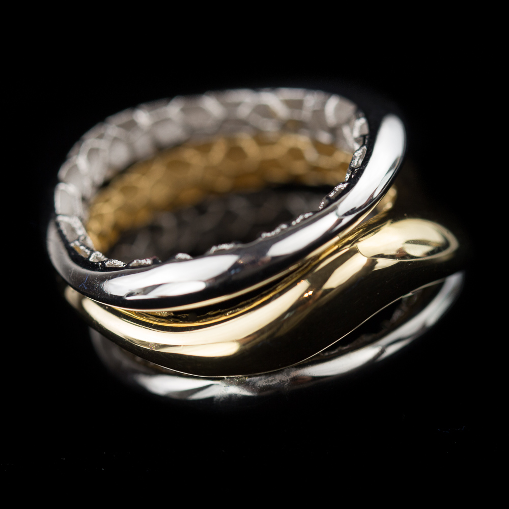 Separate Three-Color Polished Ring Made of Three Interconnected Rings Made; And in the Colors of Silver; Gray and Gold Plated. Trendy Ring That Fits Many Jewelry. Also available in The Matte Silver. The Sanjoya Collection
