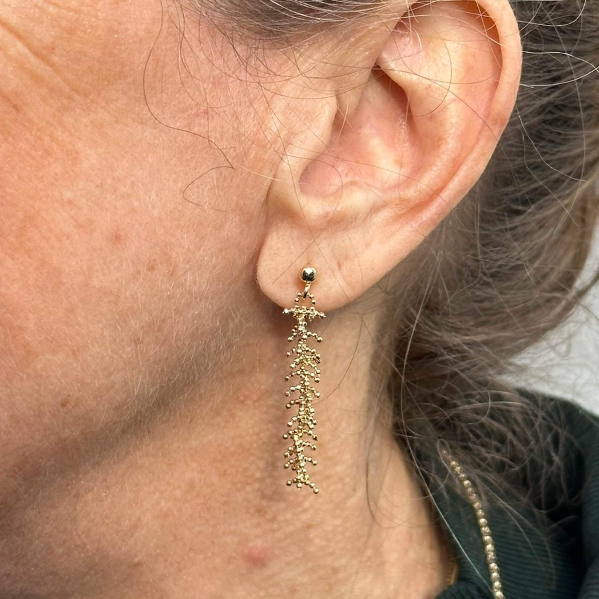 Gouden lange oorbellen met verfijnde vertakkingen van 18kt