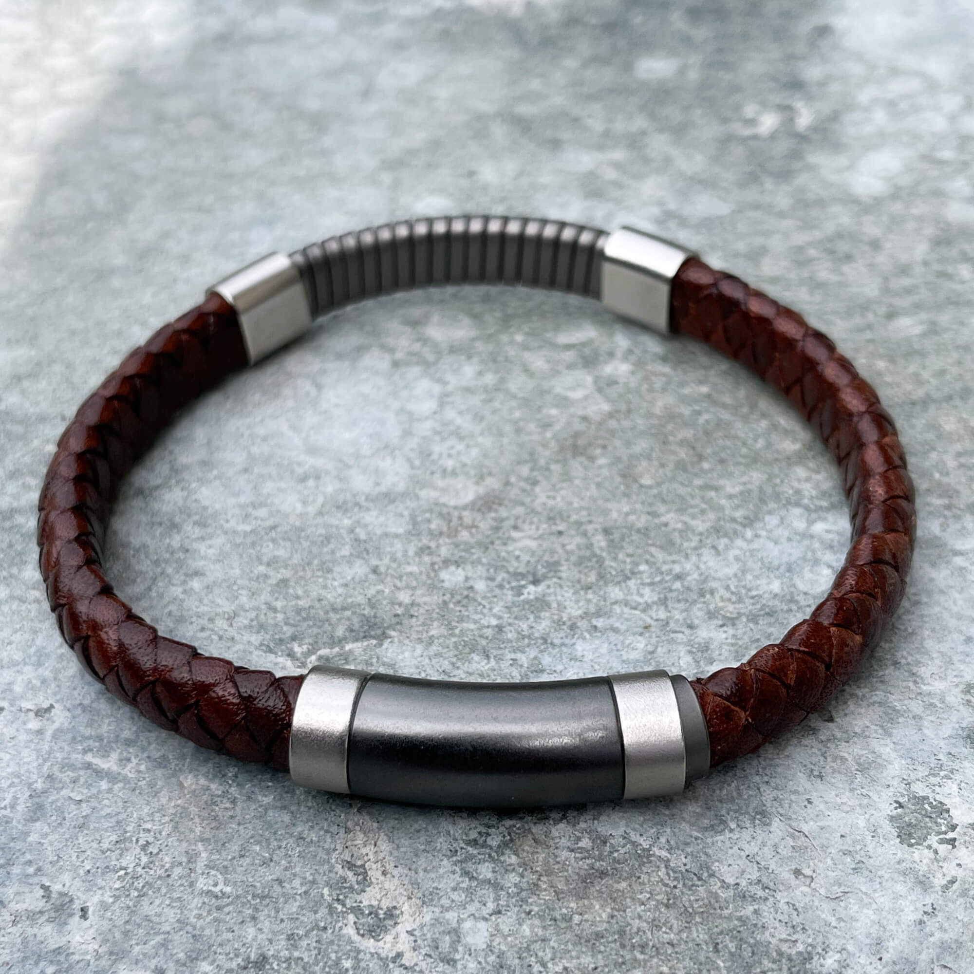 Brown braided bracelet with silver gray accents