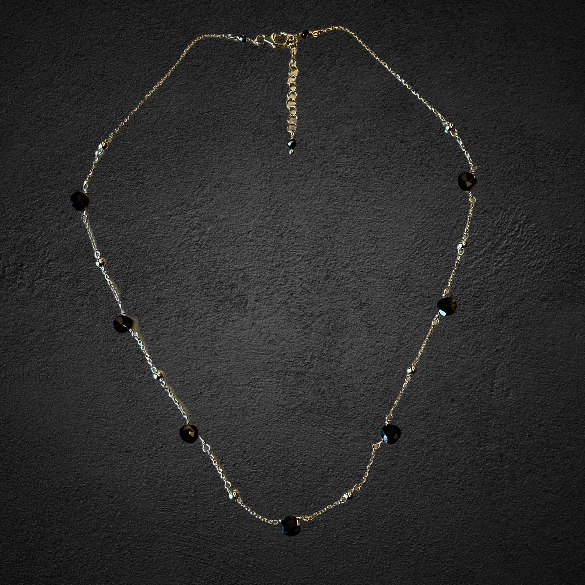 Gold-plated necklace with Onyx stones