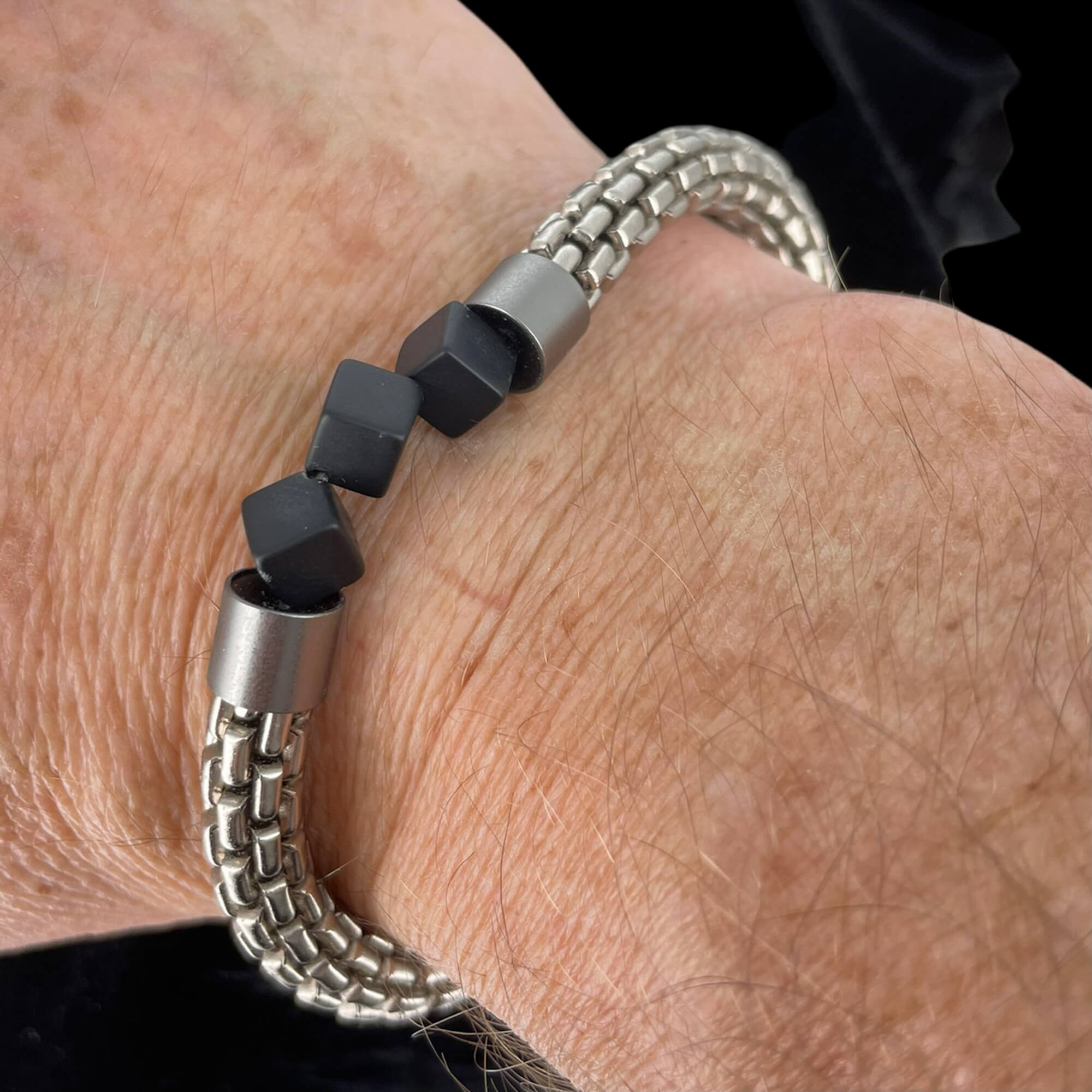 Gray bracelet with black natural stone