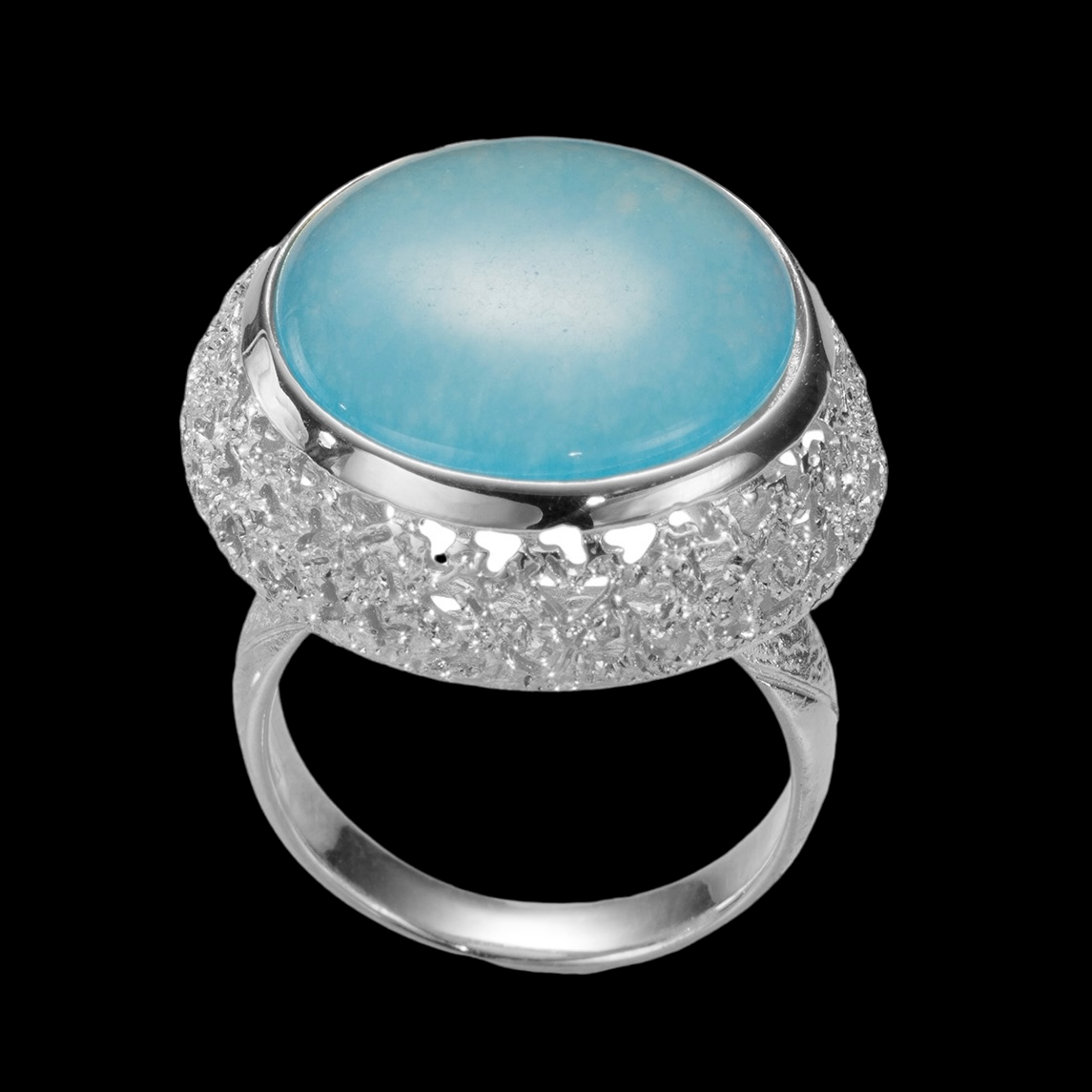 Created silver ring with a blue quartz stone