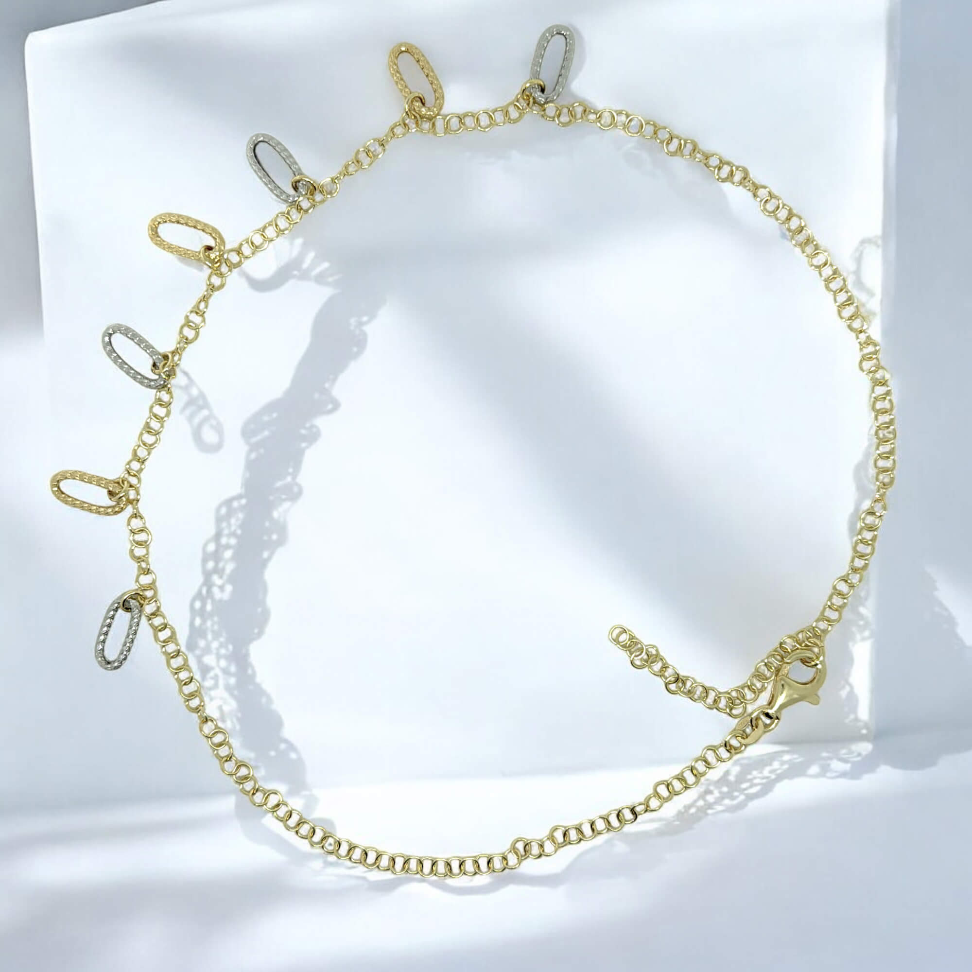 Decorated gold-plated necklace with two-tone pendants