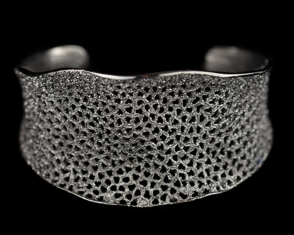 Refined silver gray bangle with flare