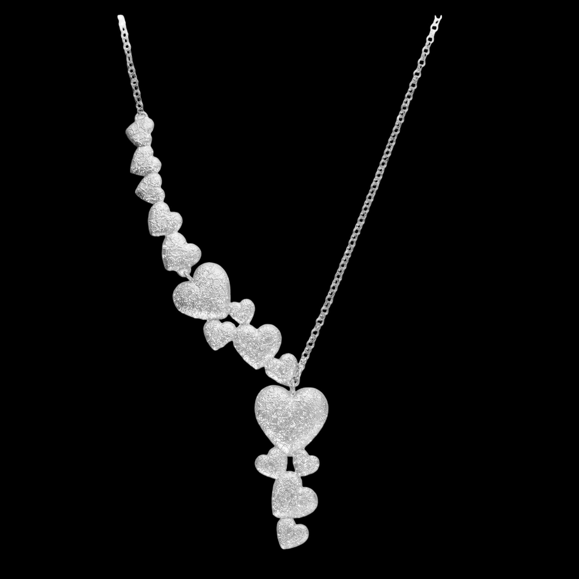 Silver necklace with multiple hearts