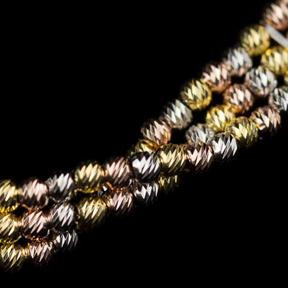 Refined bracelet of three rows of silver. rosé and gilt