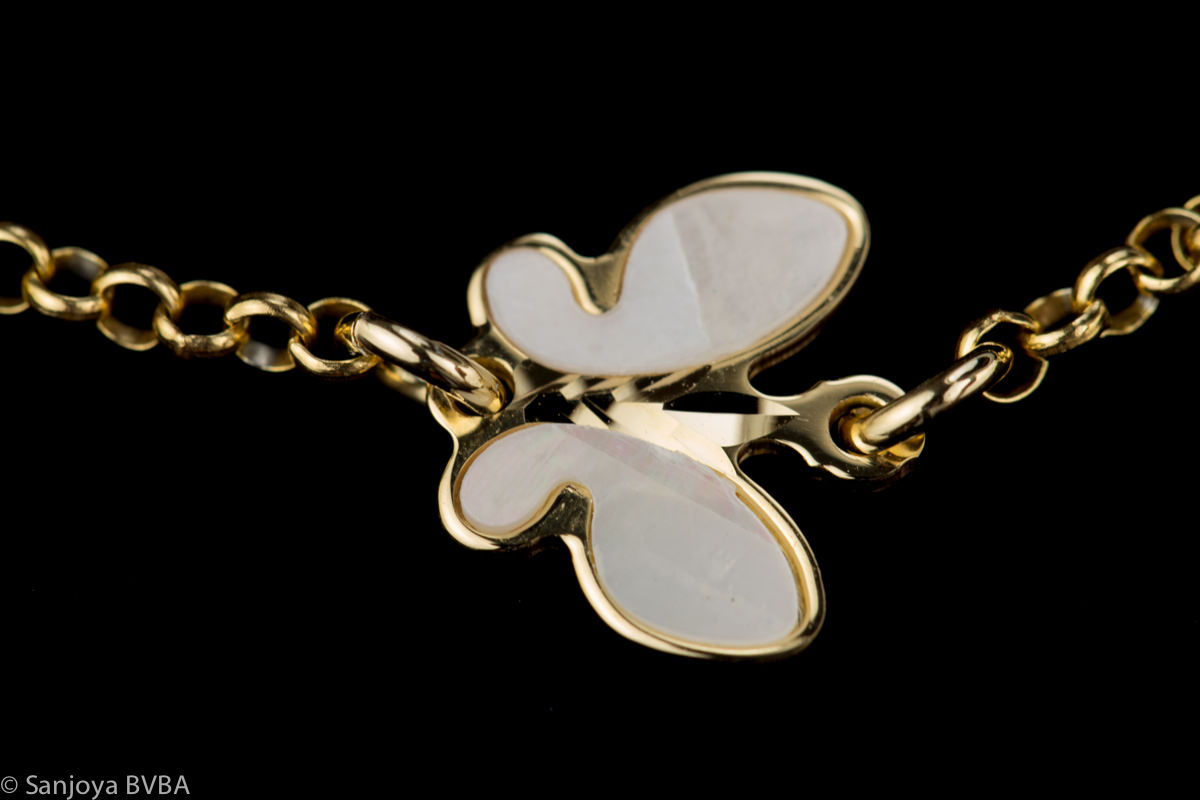 Gold plated bracelet with pearl butterflies