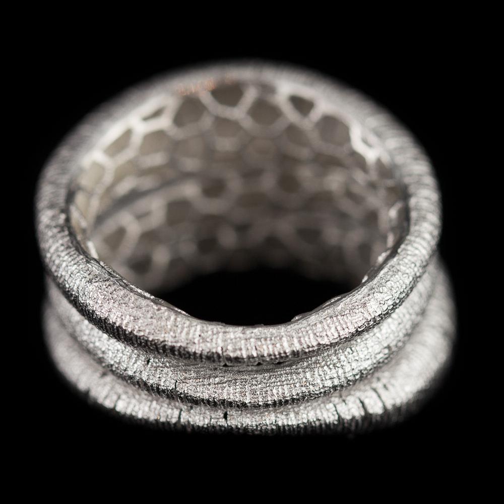 Wide three row silver ring
