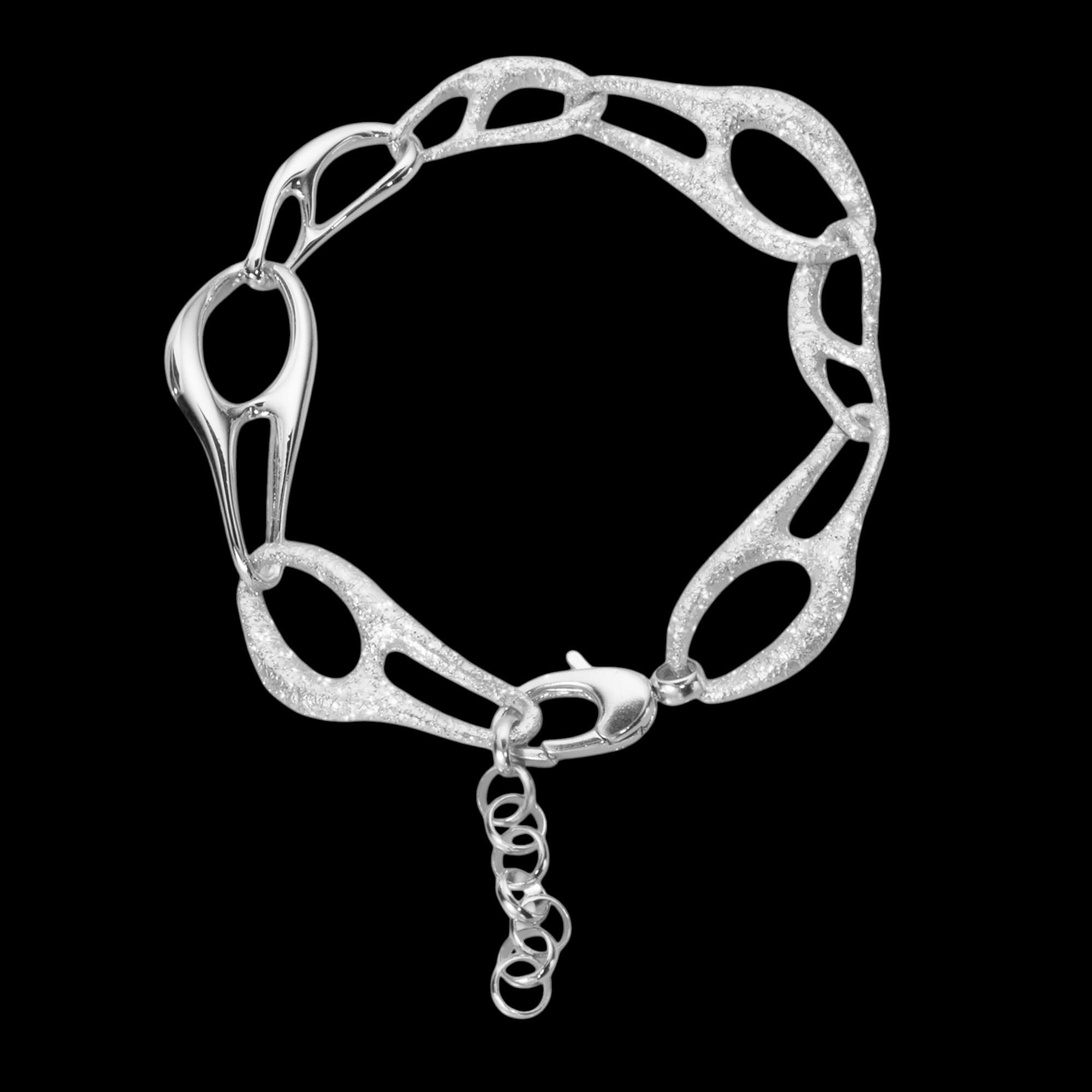 Bracelet en argent à motif de volutes et de maillons
