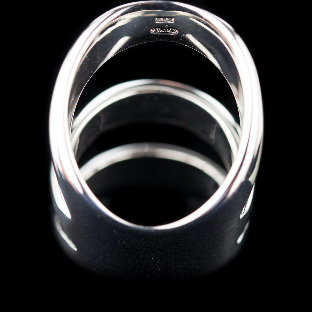 Silver ring, shiny and three rows