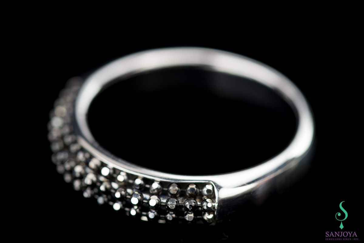 Silver ring with black sparkles