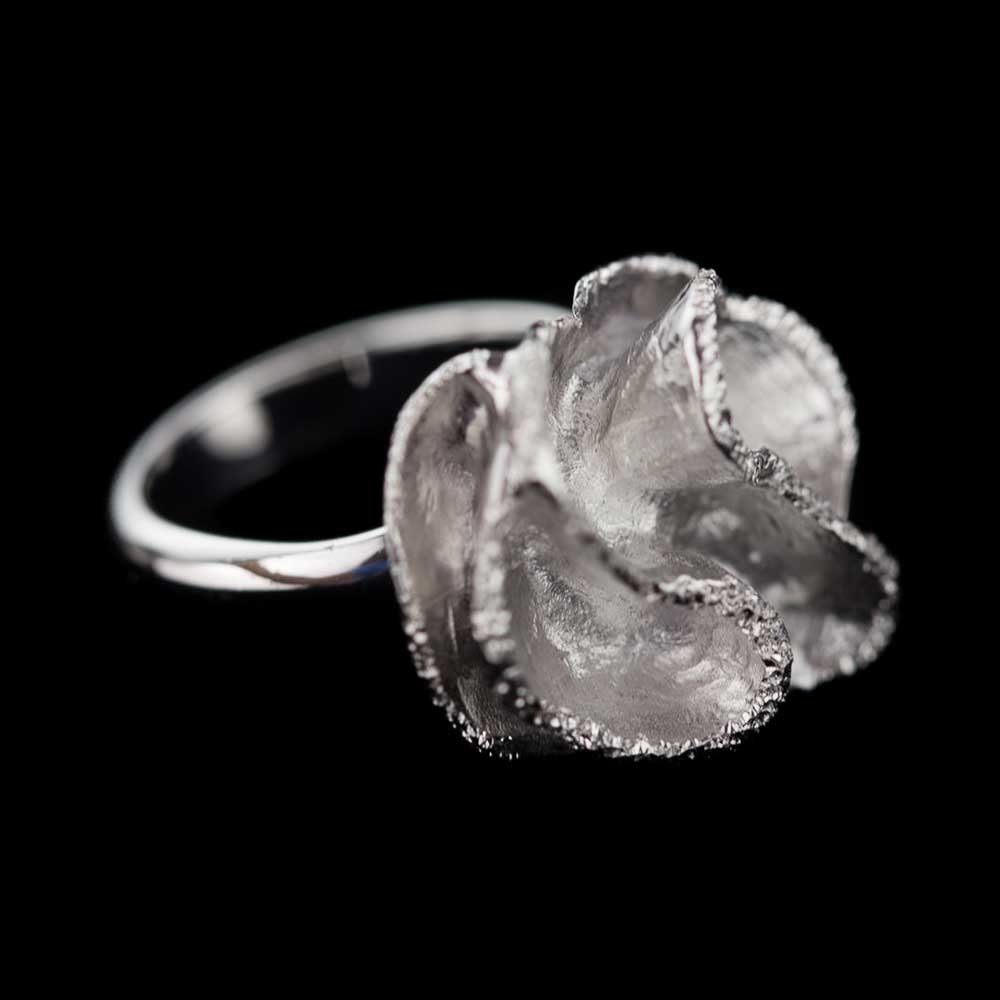 Small silver diamond-tipped flower ring