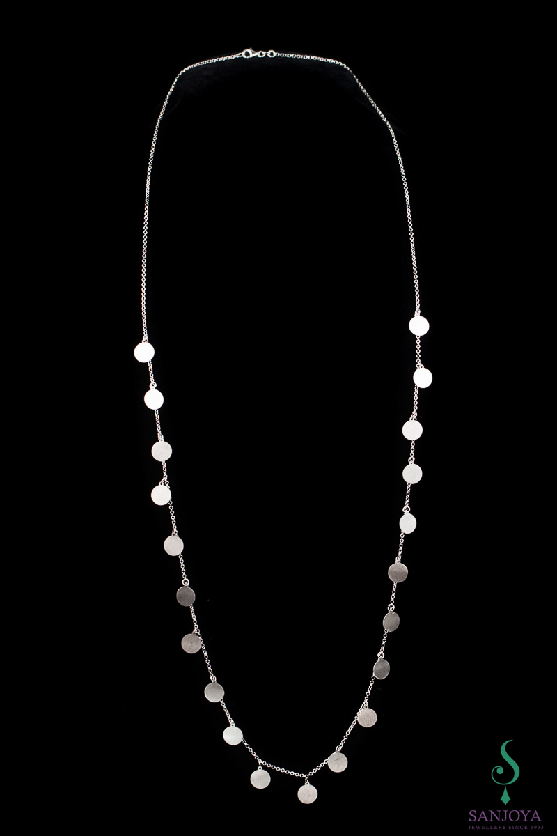 Long silver necklace with circles
