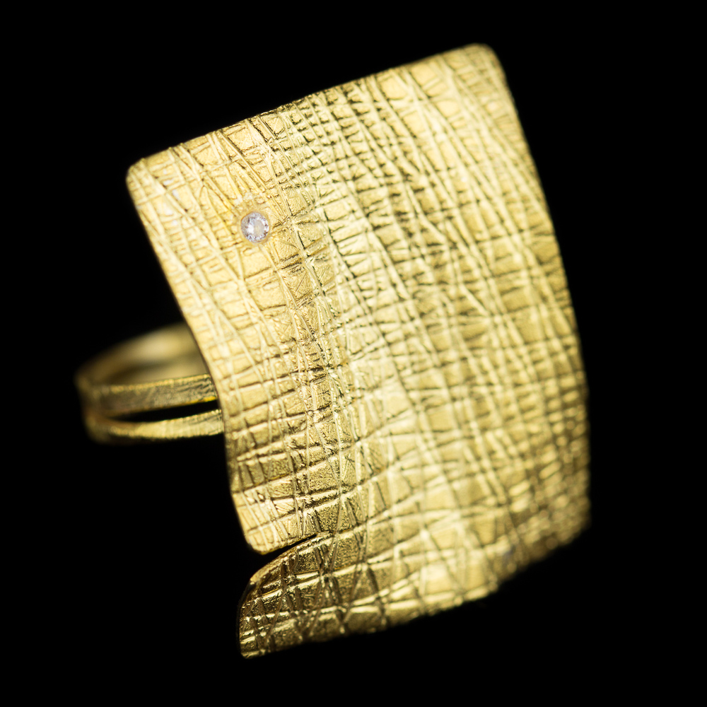 Gold plated rectangular ring with zirconia stone