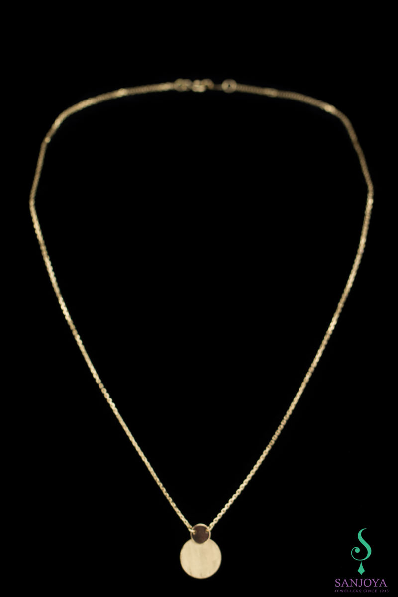Gold chain with two circles as a pendant; 18 kt