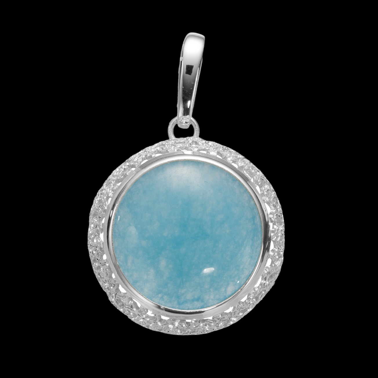 Created silver pendant with a blue quartz stone
