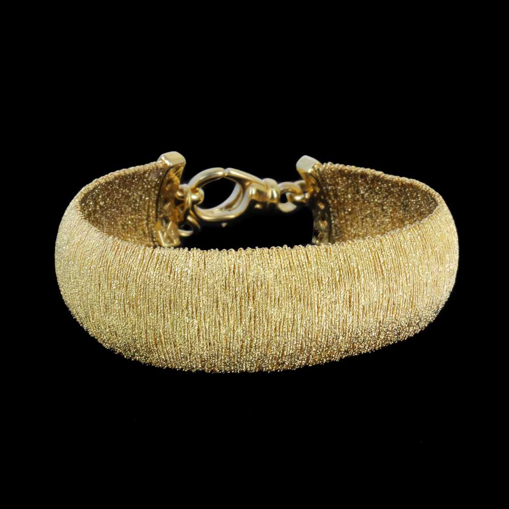 Chic and wide gold plated bracelet