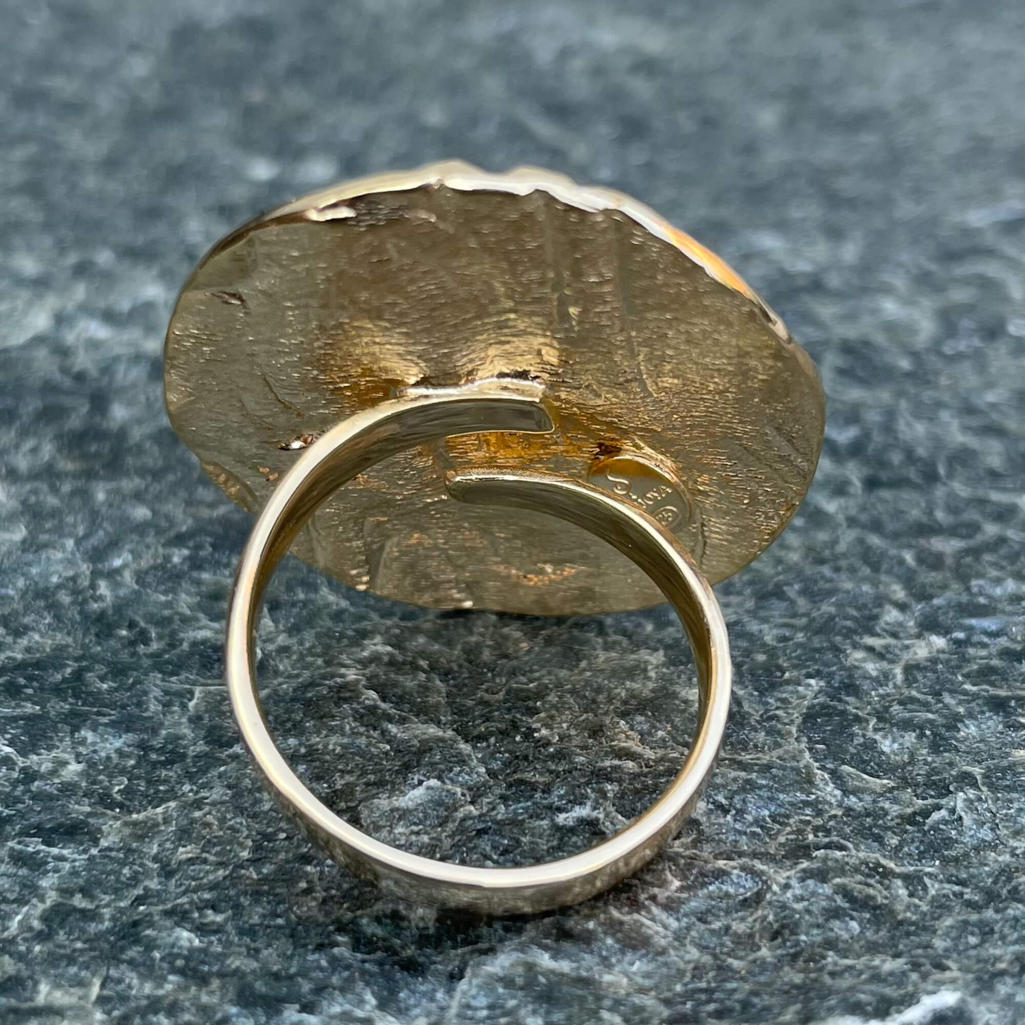 Created round ring made of gold-plated silver