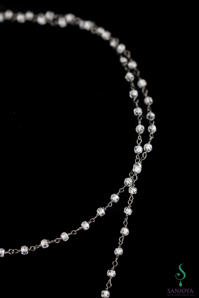 OX0218004 - Lange ketting met hanger van zwart hematiet en kristal