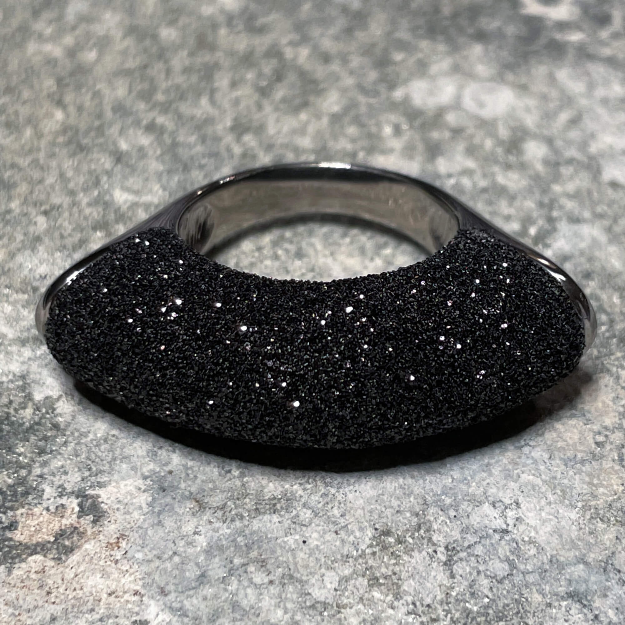 Beautiful and elongated black ring of silver