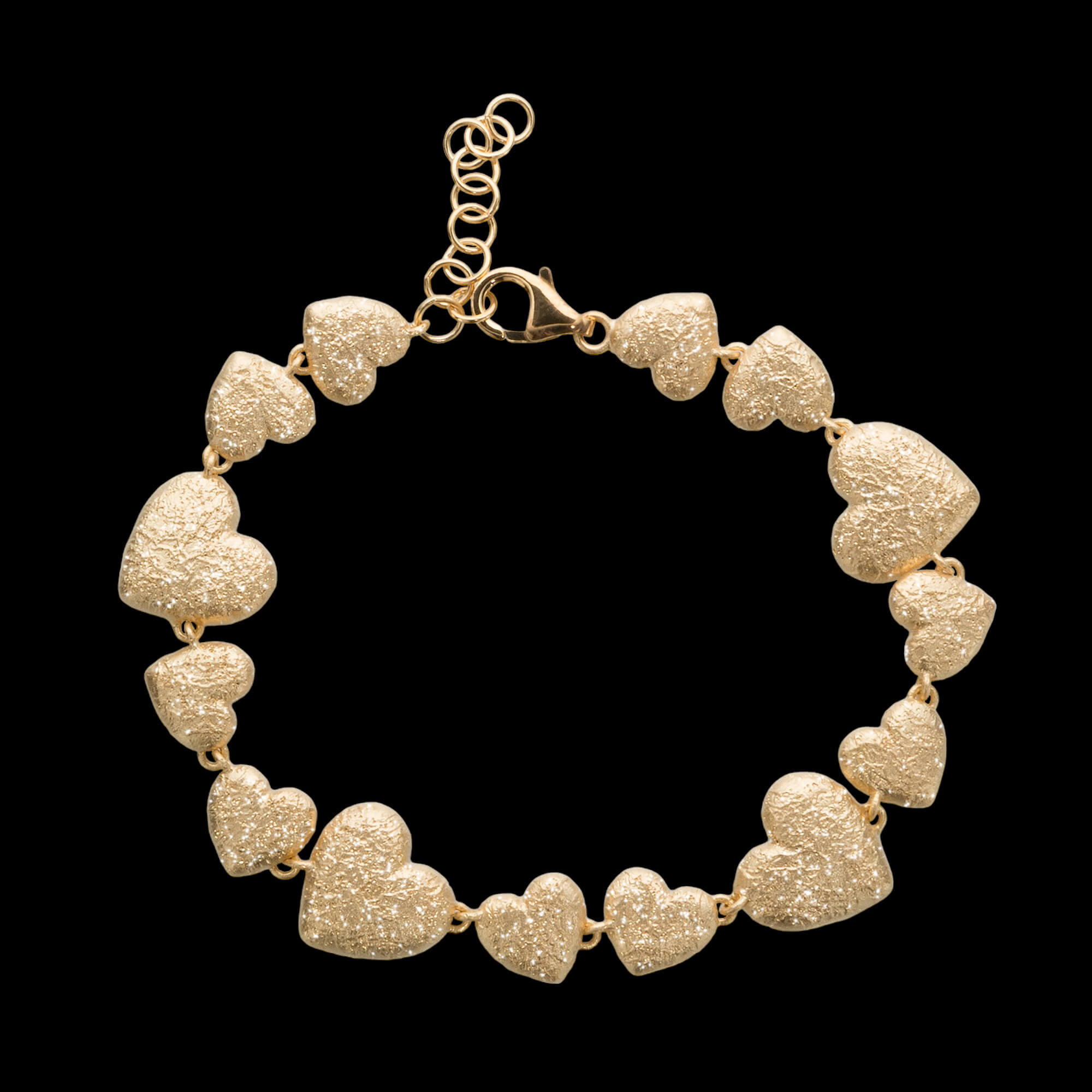Gilded bracelet with multiple hearts