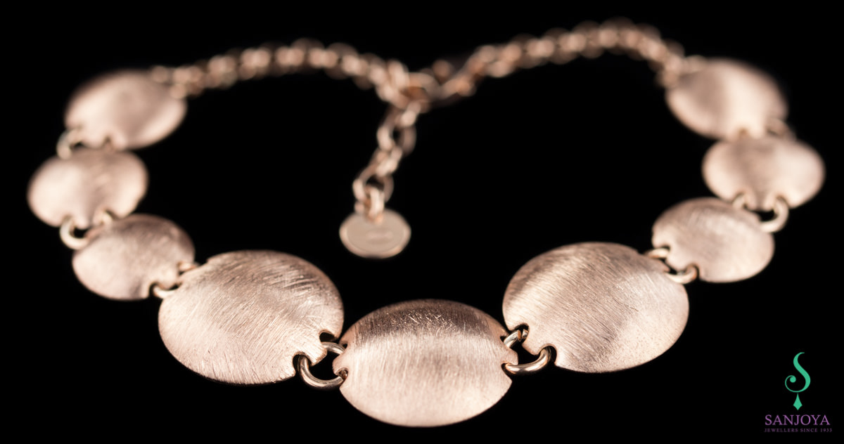 Rose gold bracelet with spheres