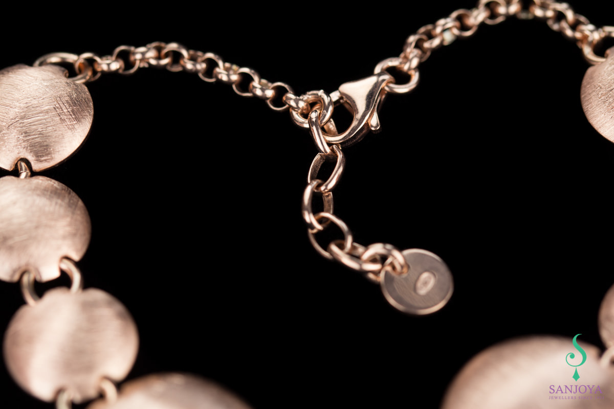 Rose gold bracelet with spheres