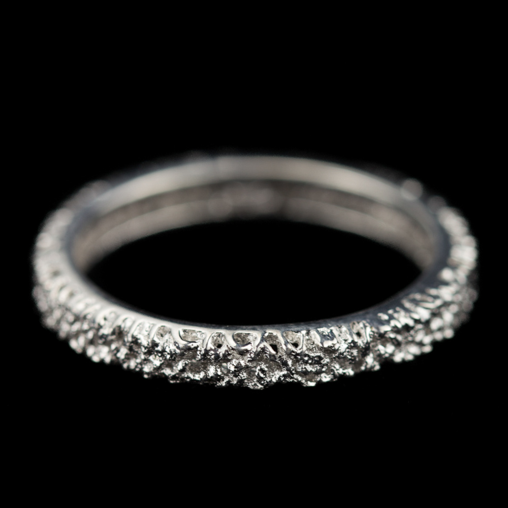 Finely machined ring of silver gray